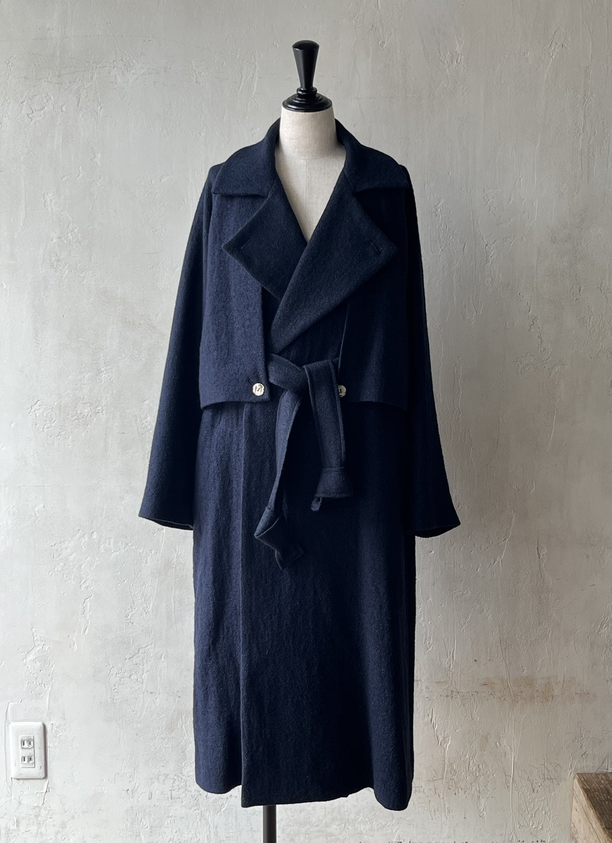AS YET UNNAMED. - THE AIR-HOLDING COAT