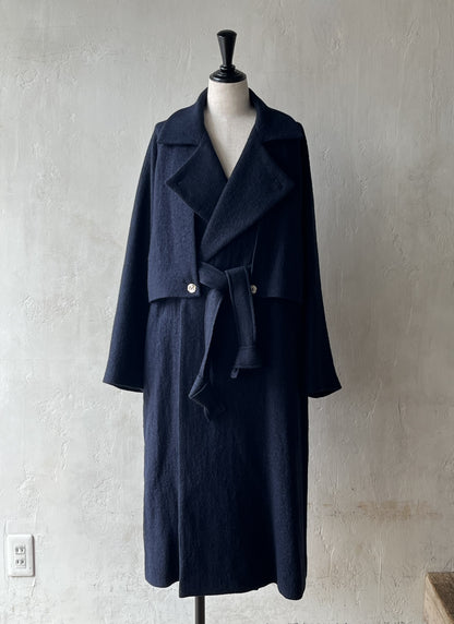 AS YET UNNAMED. - THE AIR-HOLDING COAT