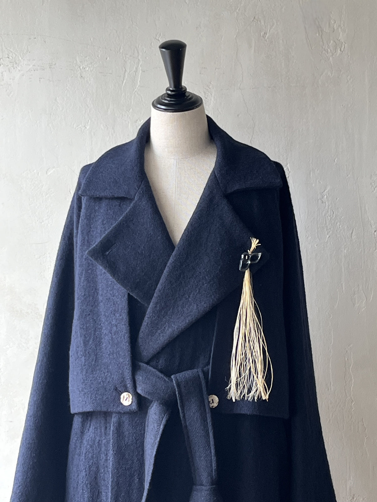 AS YET UNNAMED. - THE AIR-HOLDING COAT