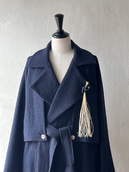 AS YET UNNAMED. - THE AIR-HOLDING COAT