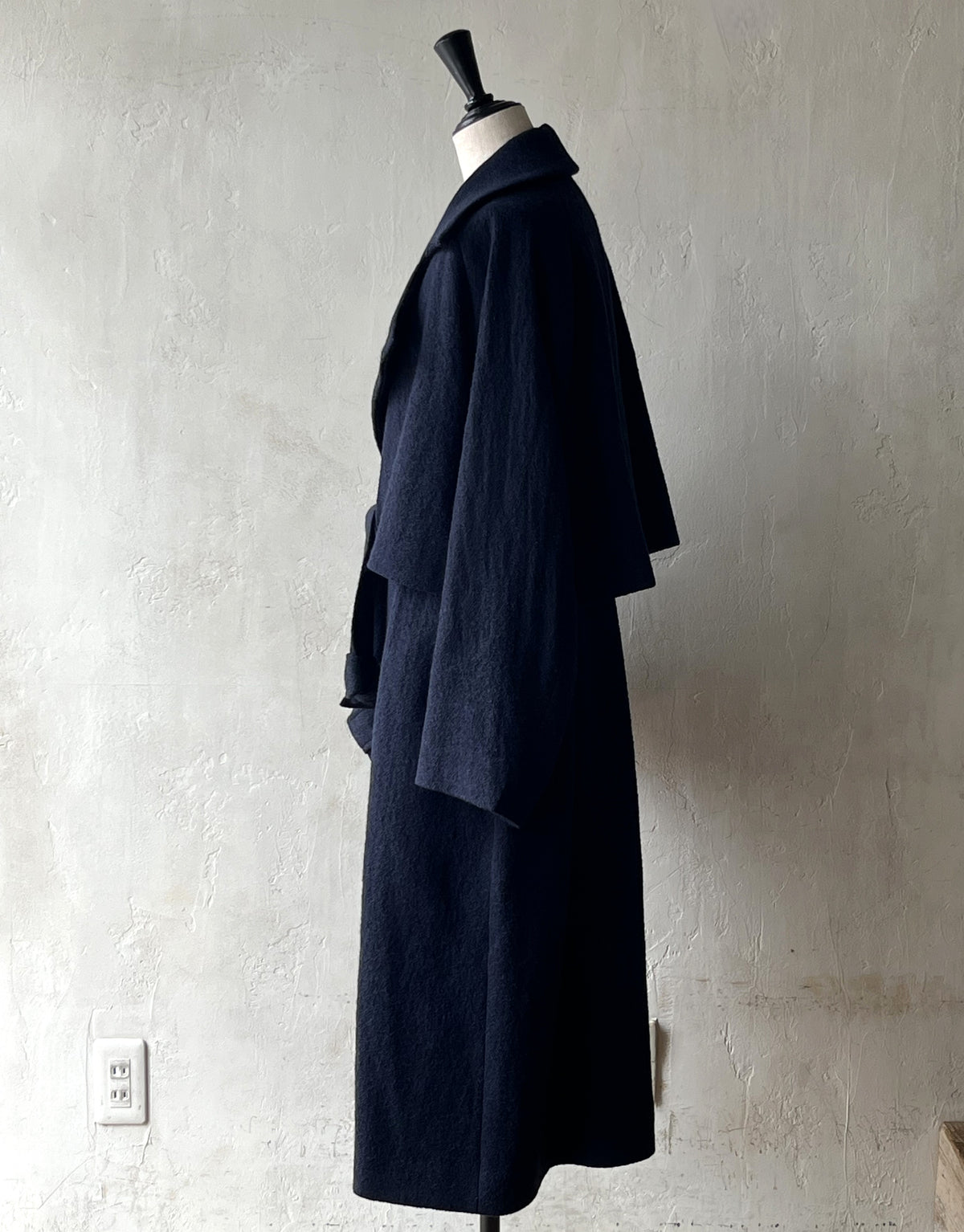 AS YET UNNAMED. - THE AIR-HOLDING COAT