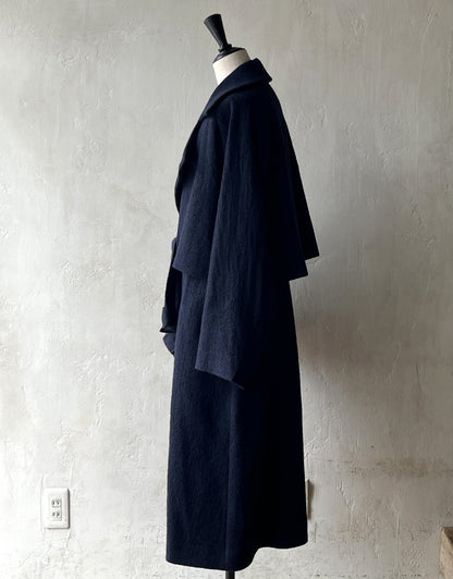 AS YET UNNAMED. - THE AIR-HOLDING COAT
