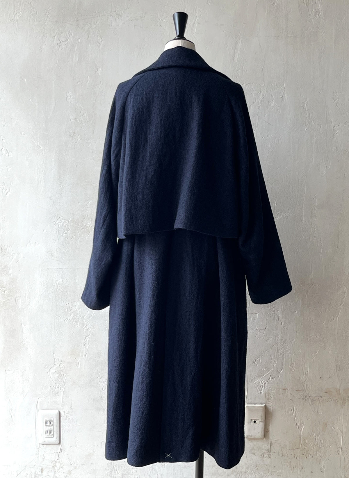 AS YET UNNAMED. - THE AIR-HOLDING COAT
