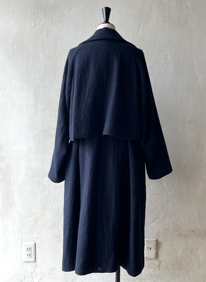 AS YET UNNAMED. - THE AIR-HOLDING COAT