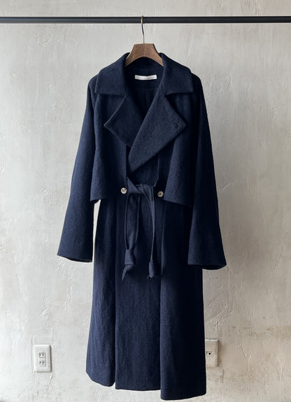 AS YET UNNAMED. - THE AIR-HOLDING COAT