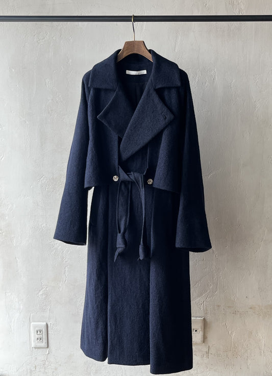 AS YET UNNAMED. - THE AIR-HOLDING COAT