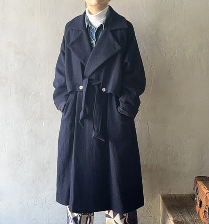 AS YET UNNAMED. - THE AIR-HOLDING COAT